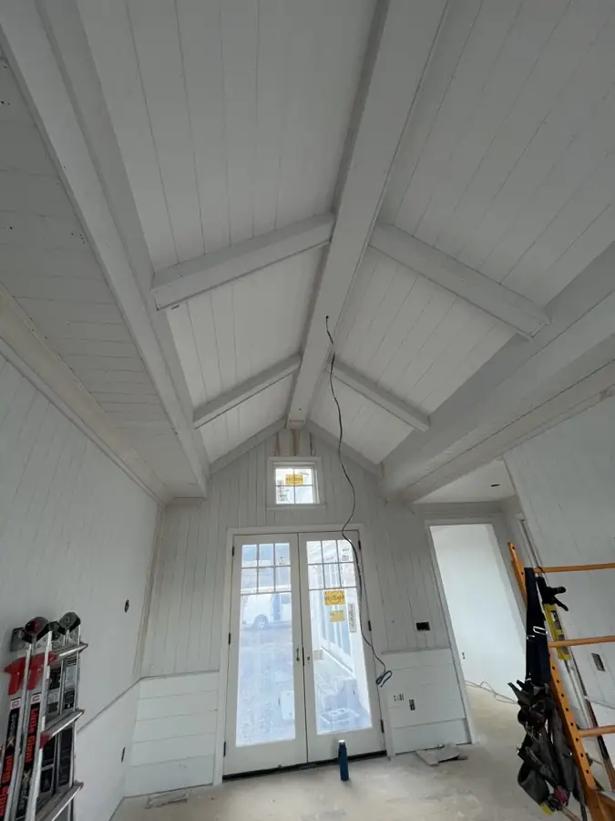 Vaulted interior finish by Pandora Group LLC.