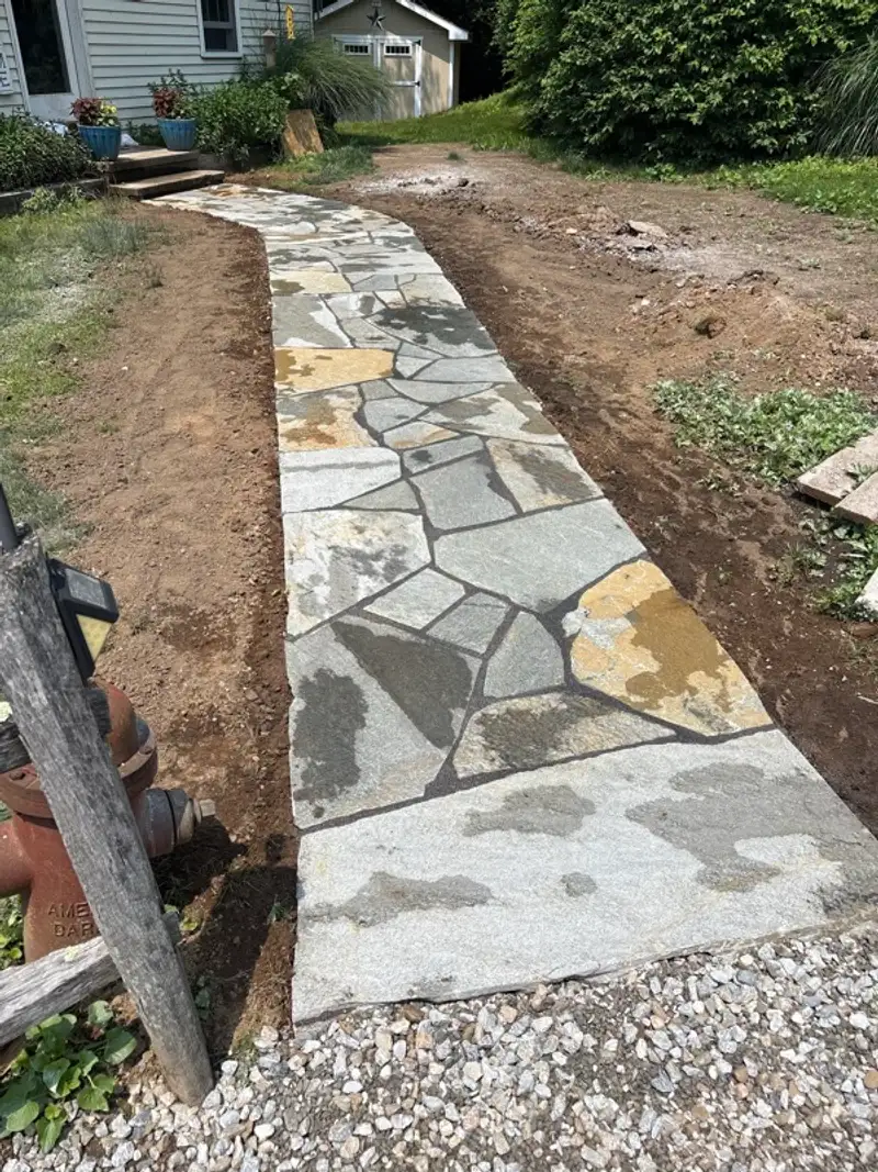 Completed flagstone walkway installed by Pandora Group LLC.
