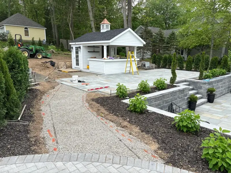 Hardscape grading and gravel path layout by Pandora Group LLC.