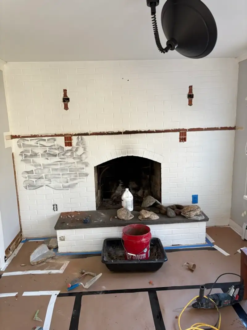 Fireplace masonry preparation by Pandora Group LLC.