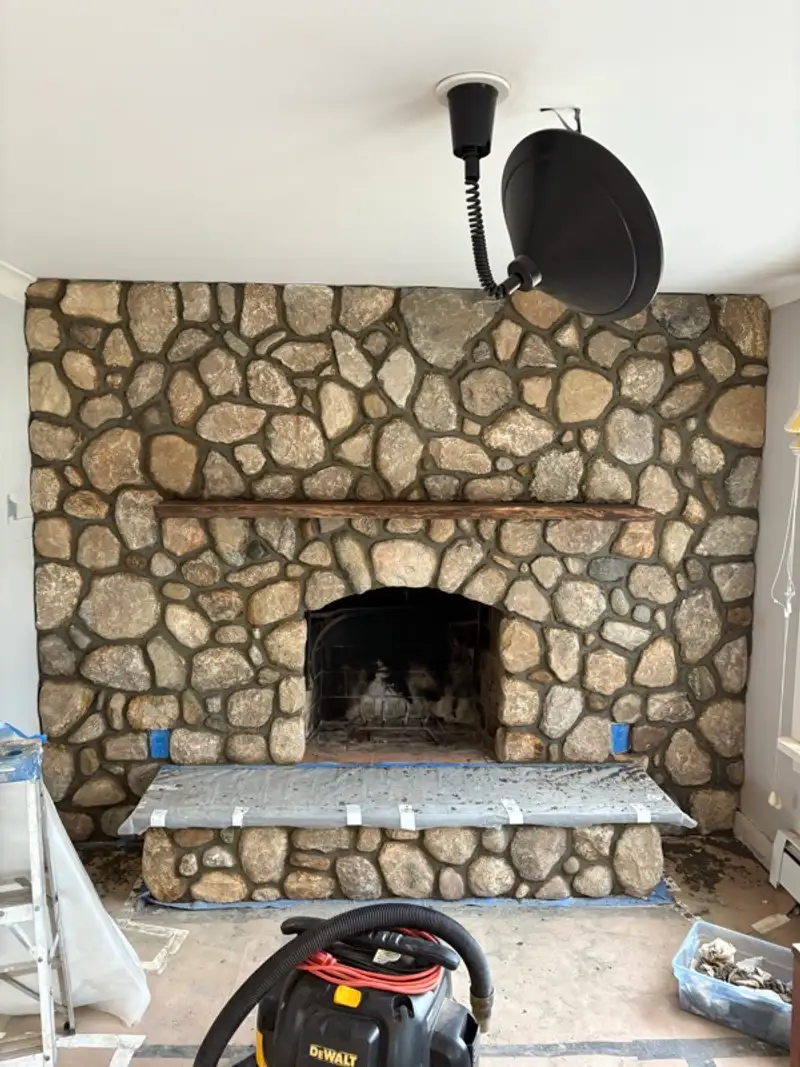 Completed stone fireplace by Pandora Group LLC.